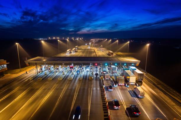 Aerial drone view on toll collection point on motorway at night. Pay road, Gliwice, Poland